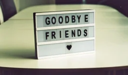 a sign that says goodbye friends