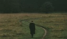 a banker on a country road going nowhere