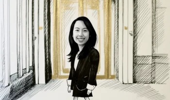 Shermaine Chia in front of a gold door 