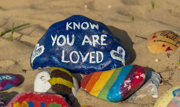a stone that says you know you are loved 