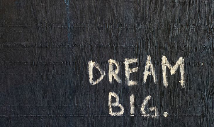 A sign saying Dream Big