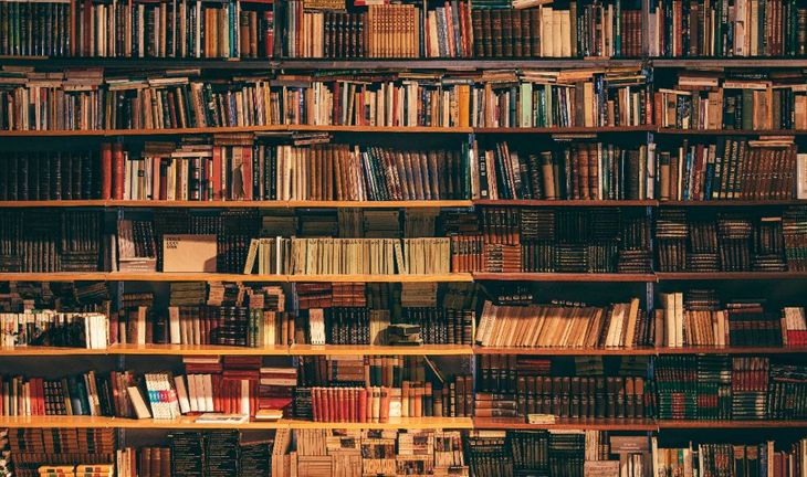 Morning Coffee: Inappropriate book seen on banker's shelf during Zoom meeting. Consultant declares it has a surfeit of staff