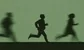 Silhouette of bankers running 