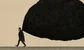 a man carrying a large black bag of coal 